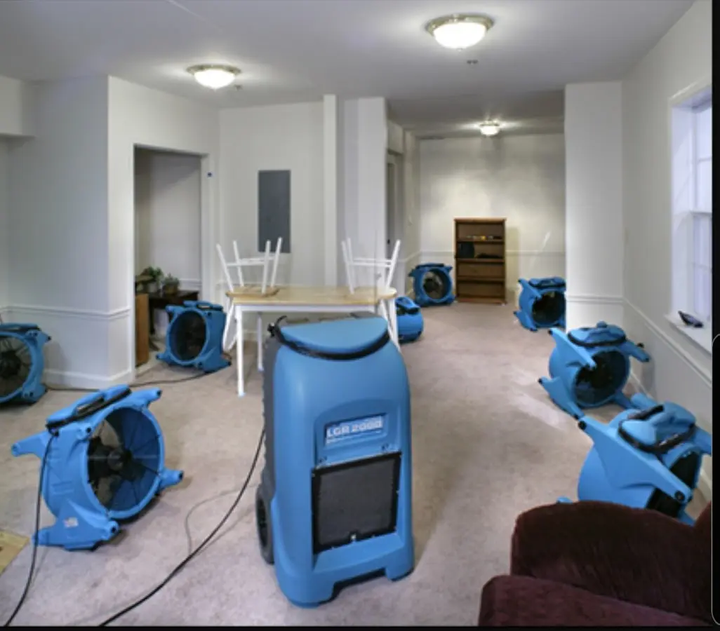 Air movers and dehumidifier setup for Water Damage Restoration in Ilion